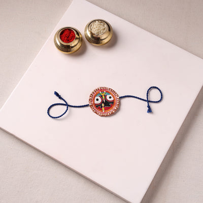 Lord Jagannath - Reusable Pattachitra Handpainted Rakhi with Potli 36