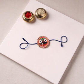 Lord Jagannath - Reusable Pattachitra Handpainted Rakhi with Potli 36