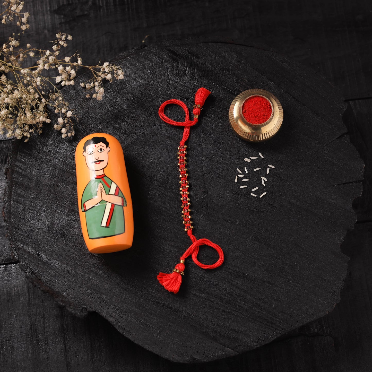 Red - Handcrafted Tribal Dokra Brass Thread Rakhi with Banaras Wood Doll Box 16