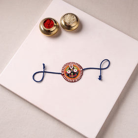 Lord Jagannath - Reusable Pattachitra Handpainted Rakhi with Potli 37