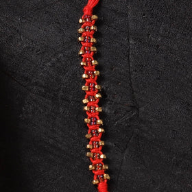 Red - Handcrafted Tribal Dokra Brass Thread Rakhi with Banaras Wood Doll Box 16