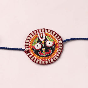 Lord Jagannath - Reusable Pattachitra Handpainted Rakhi with Potli 37