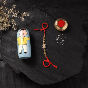 Red - Handcrafted Tribal Dokra Brass Thread Rakhi with Banaras Wood Doll Box 17