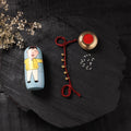 Red - Handcrafted Tribal Dokra Brass Thread Rakhi with Banaras Wood Doll Box 13