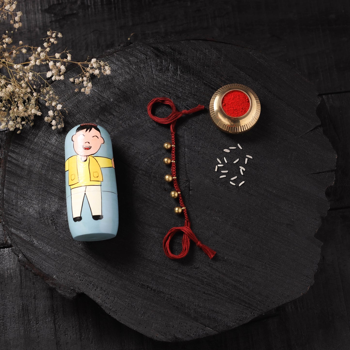 Red - Handcrafted Tribal Dokra Brass Thread Rakhi with Banaras Wood Doll Box 13