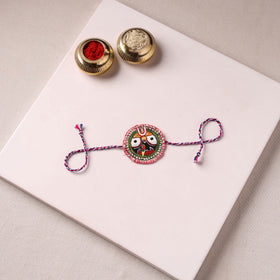 Lord Jagannath - Reusable Pattachitra Handpainted Rakhi with Potli 40