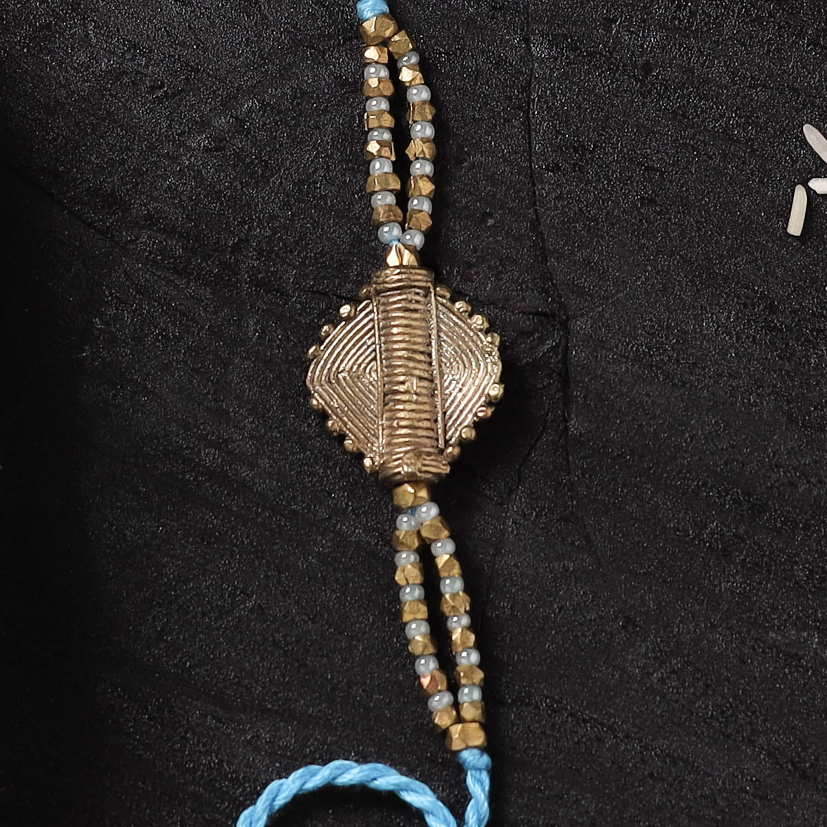 Blue - Handcrafted Tribal Dokra Brass Thread Rakhi with Banaras Wood Doll Box 18