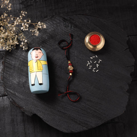 Multicolor - Handcrafted Tribal Dokra Brass Thread Rakhi with Banaras Wood Doll Box 19
