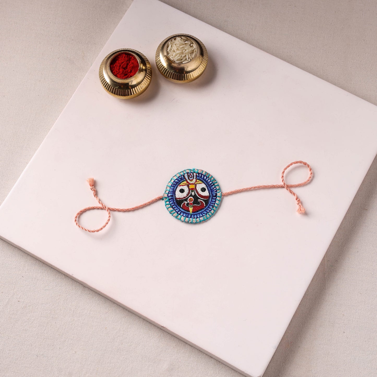 Lord Jagannath - Reusable Pattachitra Handpainted Rakhi with Potli 41