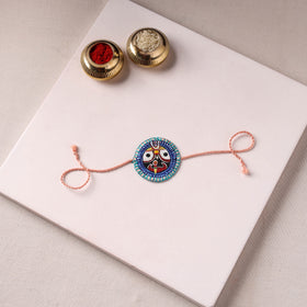 Lord Jagannath - Reusable Pattachitra Handpainted Rakhi with Potli 41