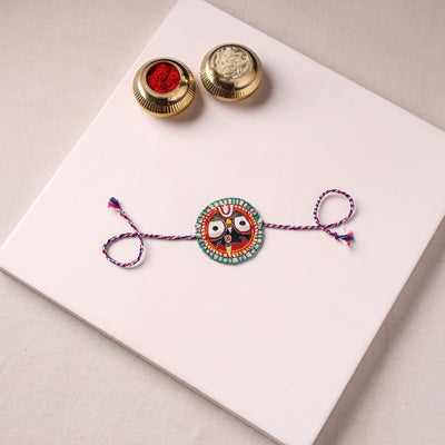 Lord Jagannath - Reusable Pattachitra Handpainted Rakhi with Potli 42