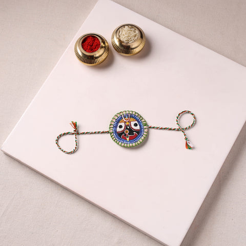 Lord Jagannath - Reusable Pattachitra Handpainted Rakhi with Potli 43