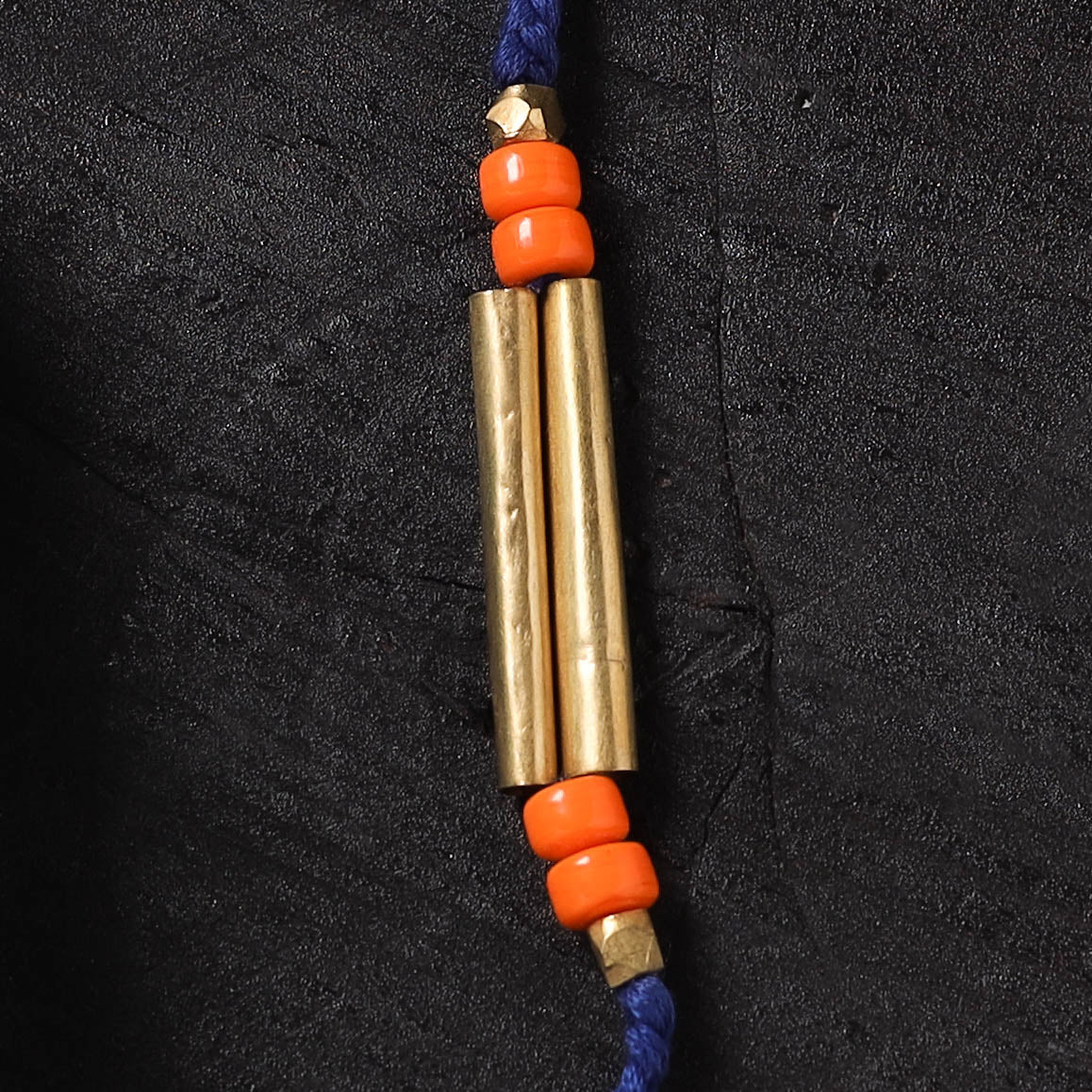Blue - Handcrafted Tribal Dokra Brass Thread Rakhi with Banaras Wood Doll Box 21