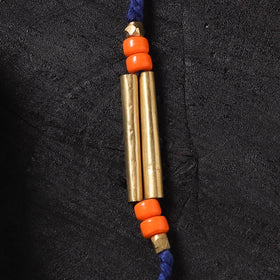 Blue - Handcrafted Tribal Dokra Brass Thread Rakhi with Banaras Wood Doll Box 21