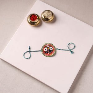 Lord Jagannath - Reusable Pattachitra Handpainted Rakhi with Potli 44