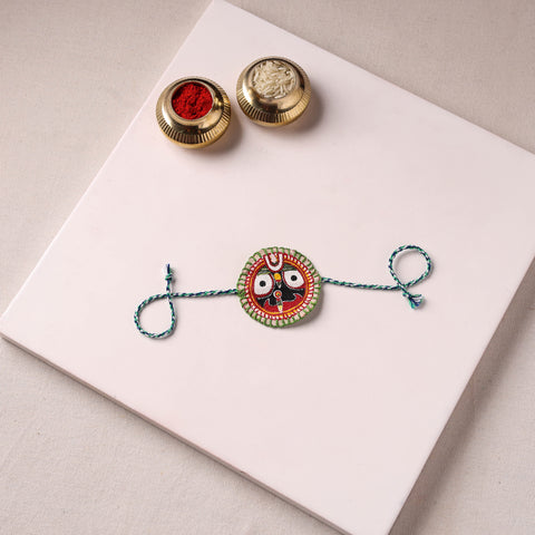 Lord Jagannath - Reusable Pattachitra Handpainted Rakhi with Potli 44