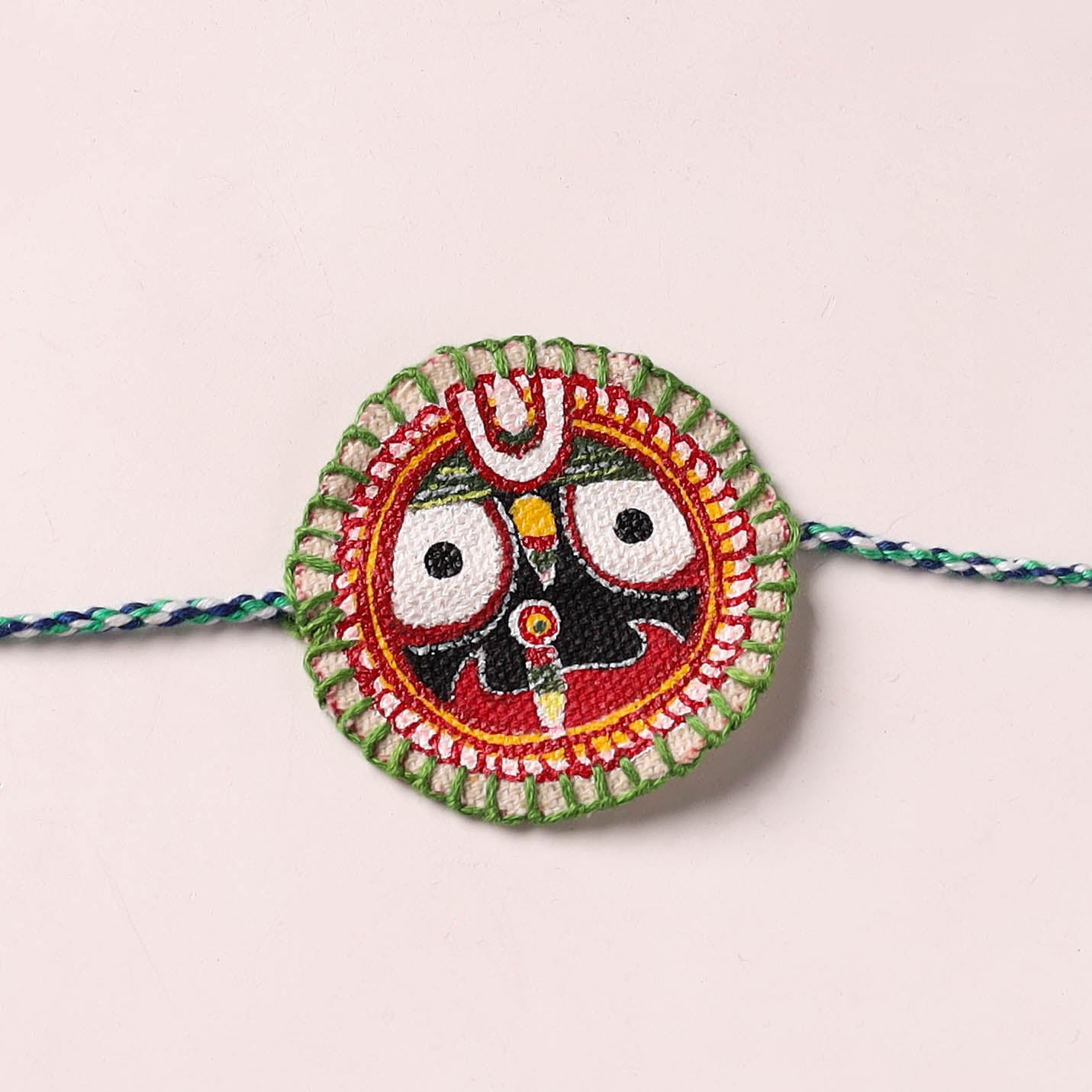 Lord Jagannath - Reusable Pattachitra Handpainted Rakhi with Potli 44