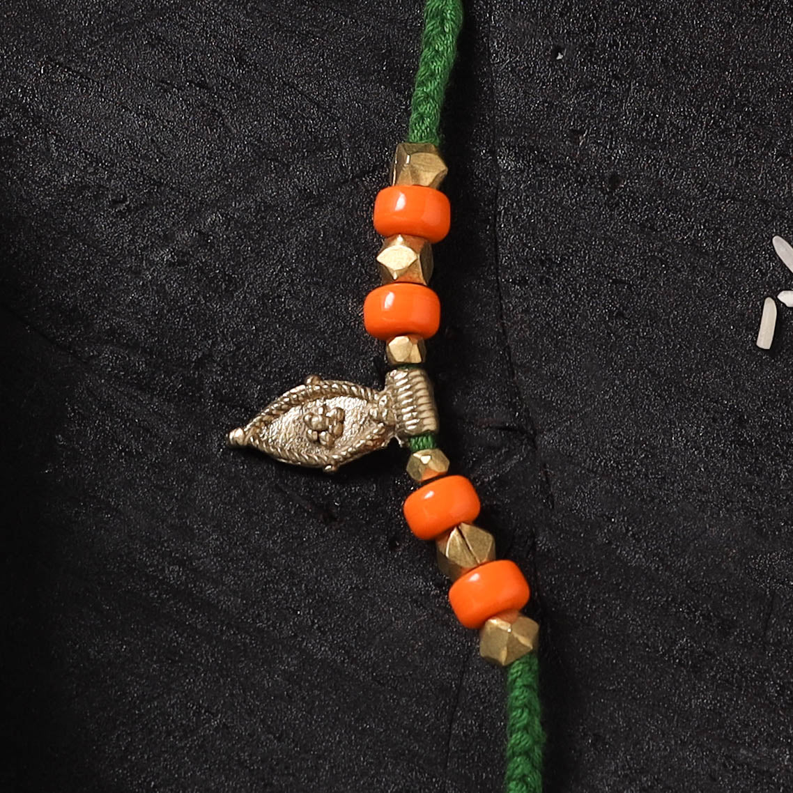 Green - Handcrafted Tribal Dokra Brass Thread Rakhi with Banaras Wood Doll Box 24