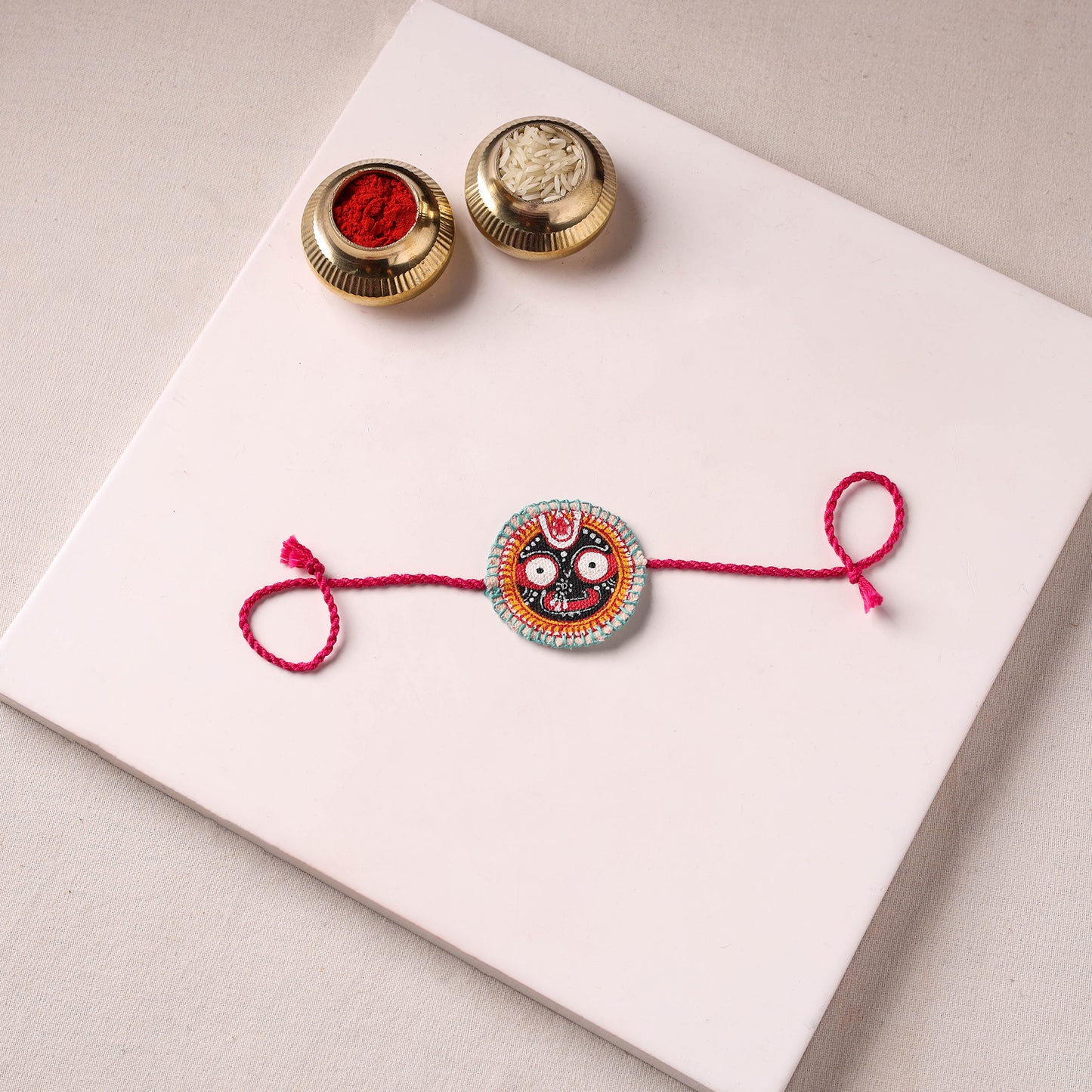 Lord Jagannath - Reusable Pattachitra Handpainted Rakhi with Potli 45