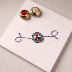 Lord Jagannath - Reusable Pattachitra Handpainted Rakhi with Potli 46