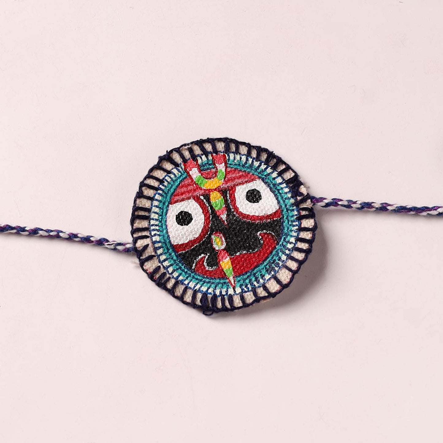 Lord Jagannath - Reusable Pattachitra Handpainted Rakhi with Potli 46