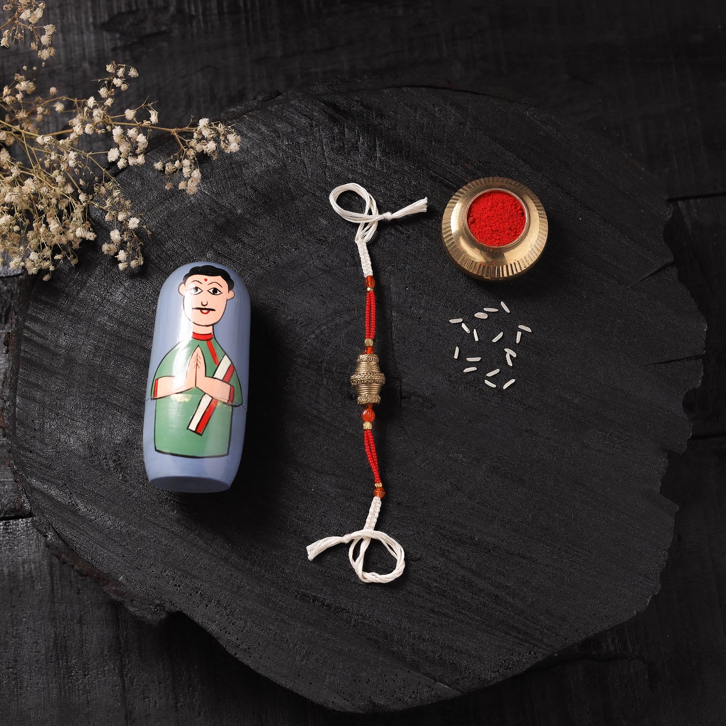 White - Handcrafted Tribal Dokra Brass Thread Rakhi with Banaras Wood Doll Box 27
