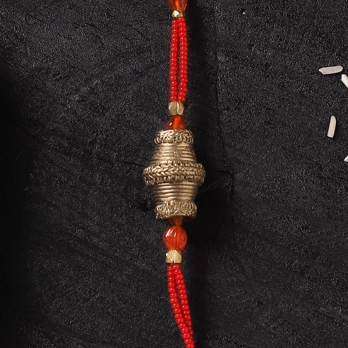 White - Handcrafted Tribal Dokra Brass Thread Rakhi with Banaras Wood Doll Box 27
