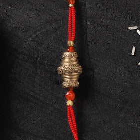 White - Handcrafted Tribal Dokra Brass Thread Rakhi with Banaras Wood Doll Box 27