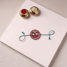 Lord Jagannath - Reusable Pattachitra Handpainted Rakhi with Potli 48
