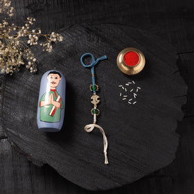 Blue - Handcrafted Tribal Dokra Brass Thread Rakhi with Banaras Wood Doll Box 28