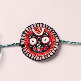 Lord Jagannath - Reusable Pattachitra Handpainted Rakhi with Potli 48