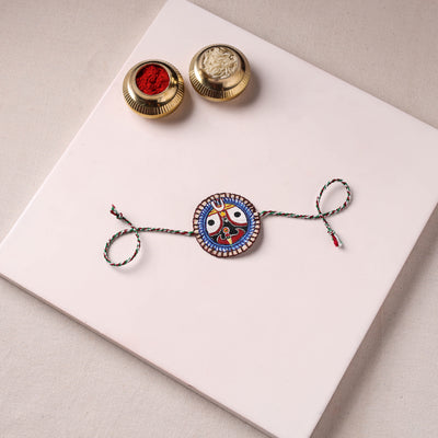 Lord Jagannath - Reusable Pattachitra Handpainted Rakhi with Potli 50
