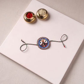 Lord Jagannath - Reusable Pattachitra Handpainted Rakhi with Potli 50