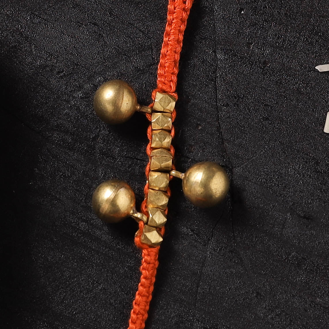 Orange - Handcrafted Tribal Dokra Brass Thread Rakhi with Banaras Wood Doll Box 29