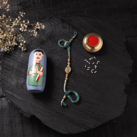 Green - Handcrafted Tribal Dokra Brass Thread Rakhi with Banaras Wood Doll Box 30