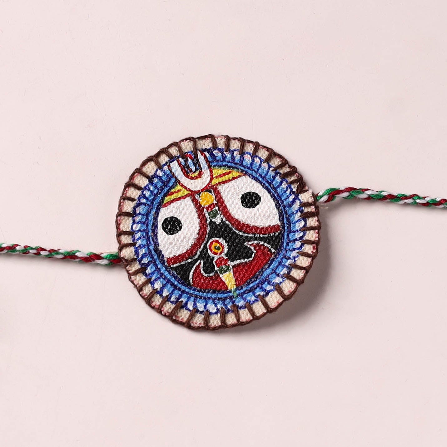 Lord Jagannath - Reusable Pattachitra Handpainted Rakhi with Potli 50