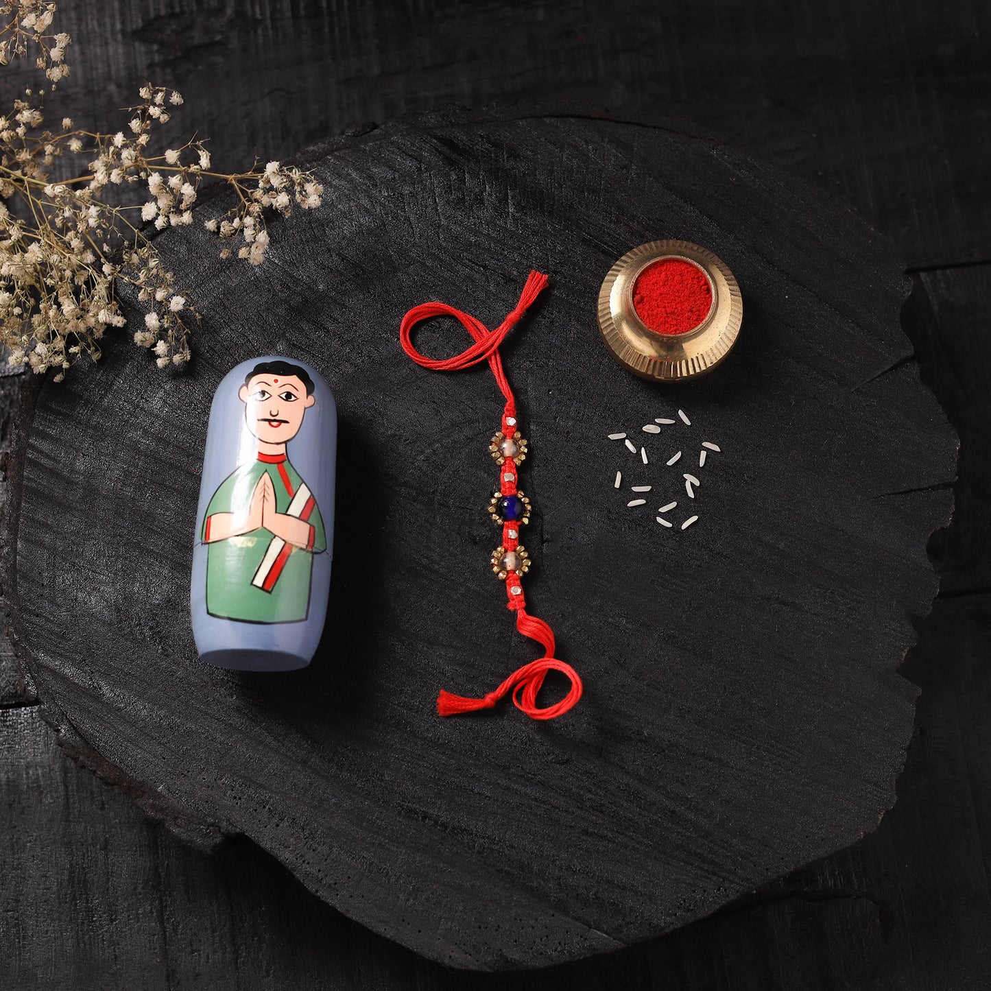 Red - Handcrafted Tribal Dokra Brass Thread Rakhi with Banaras Wood Doll Box 31