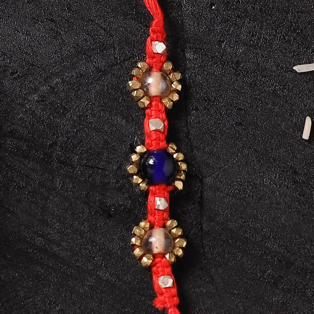 Red - Handcrafted Tribal Dokra Brass Thread Rakhi with Banaras Wood Doll Box 31