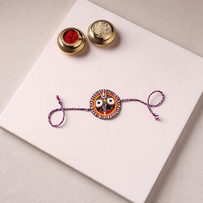 Lord Jagannath - Reusable Pattachitra Handpainted Rakhi with Potli 52