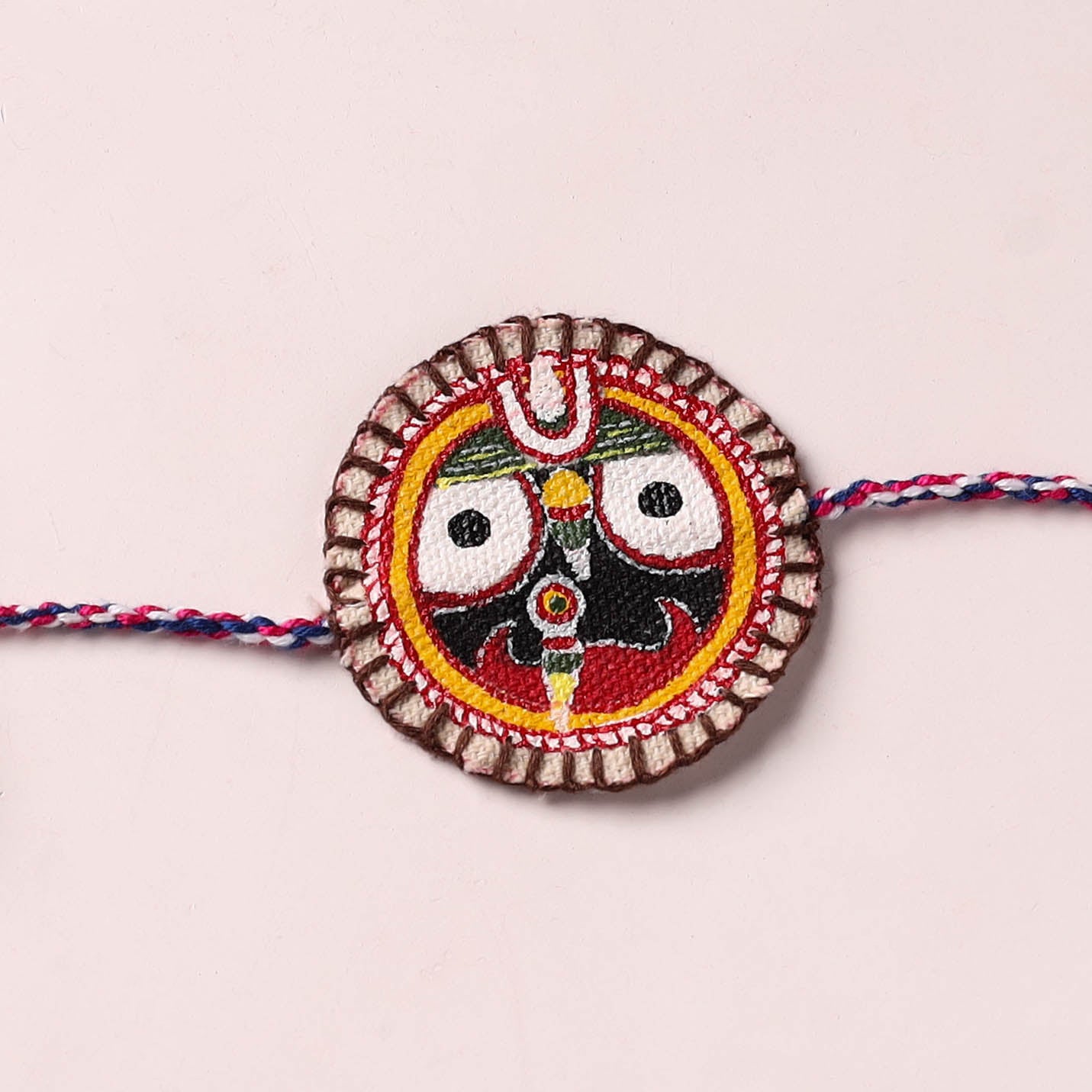 Lord Jagannath - Reusable Pattachitra Handpainted Rakhi with Potli 52