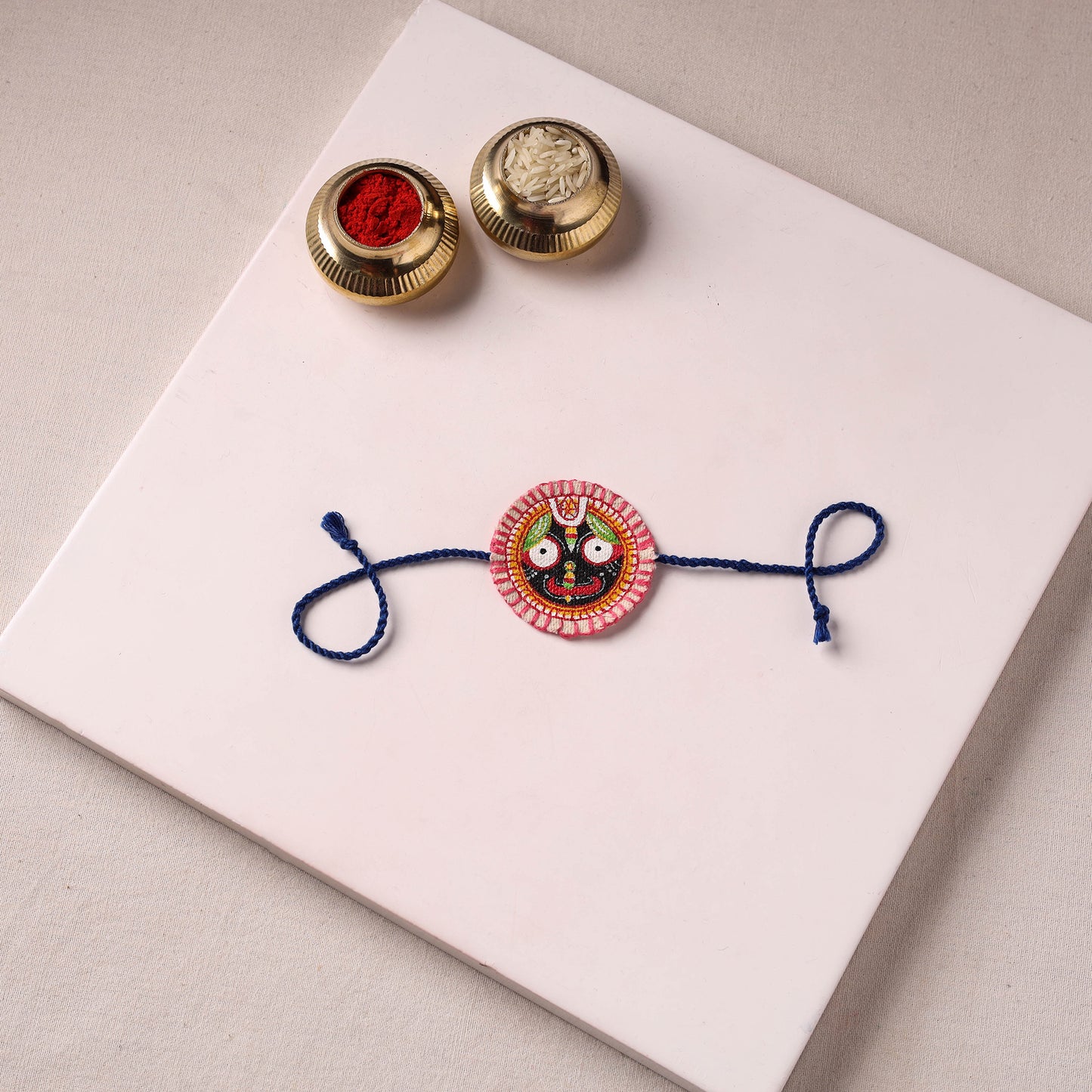 Lord Jagannath - Reusable Pattachitra Handpainted Rakhi with Potli 53