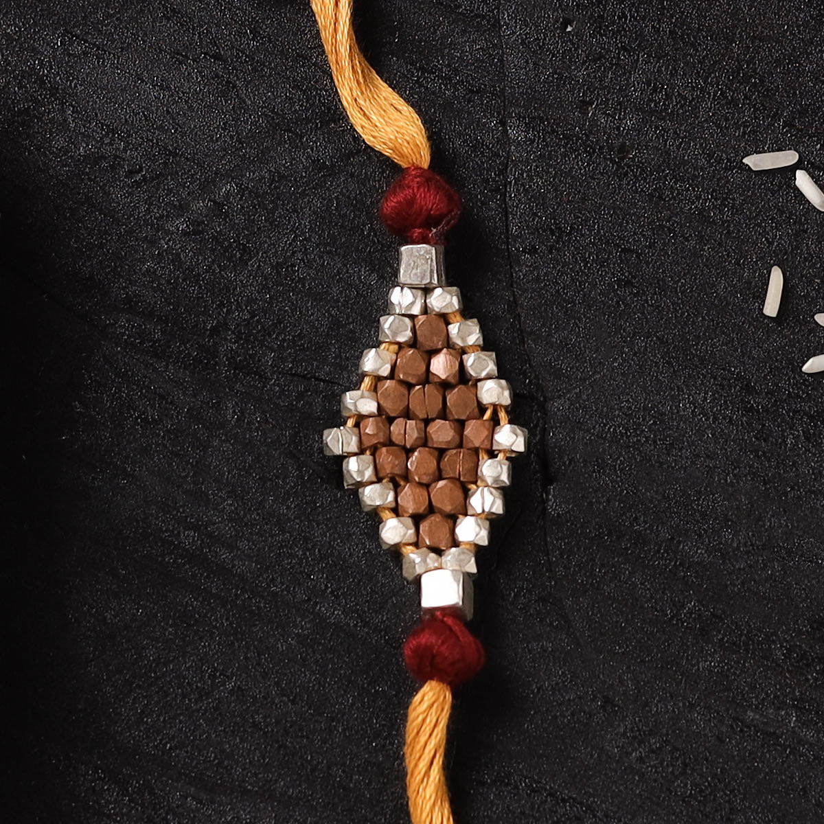 Yellow - Handcrafted Tribal Dokra Brass Thread Rakhi with Banaras Wood Doll Box 32