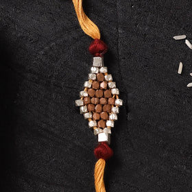 Yellow - Handcrafted Tribal Dokra Brass Thread Rakhi with Banaras Wood Doll Box 32