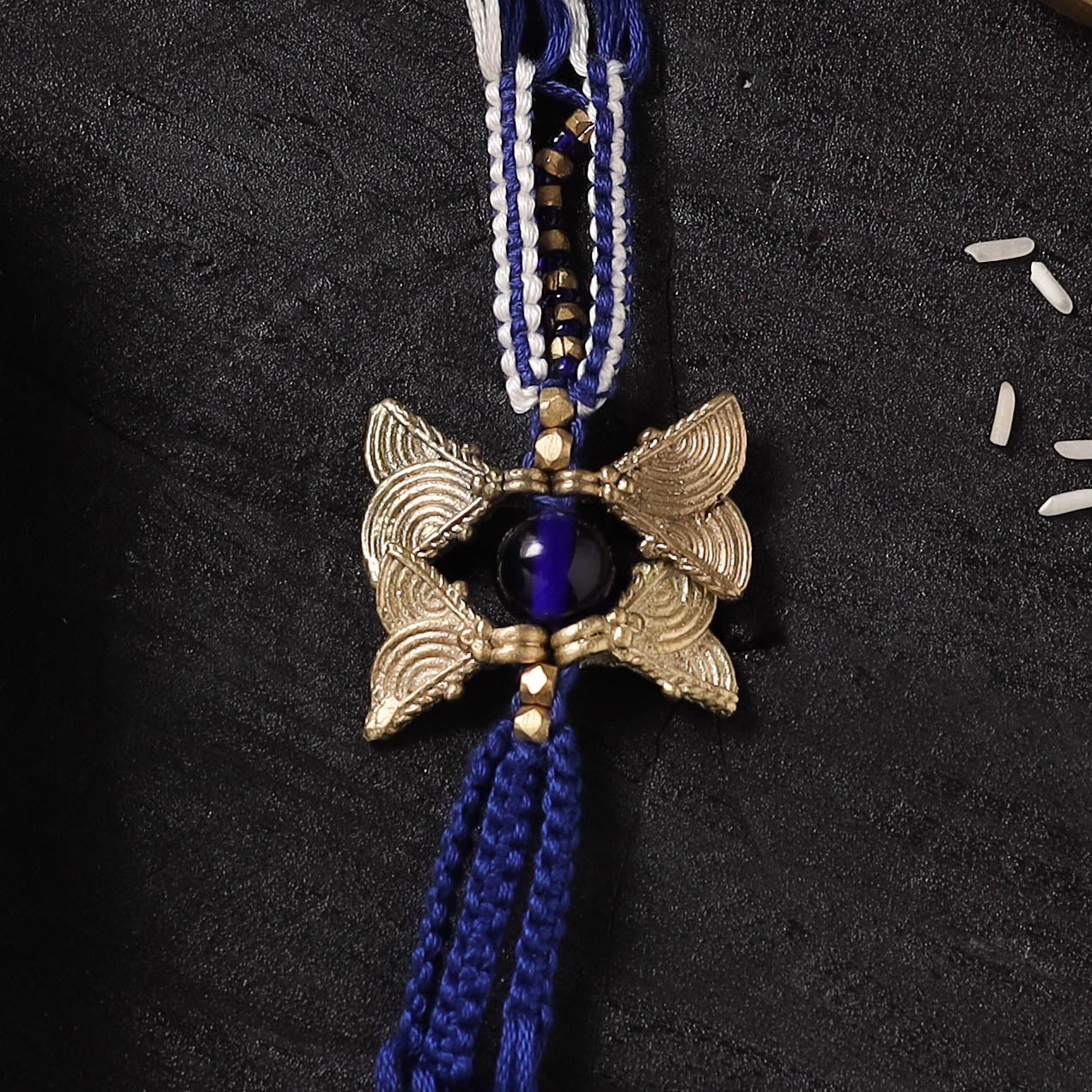 Blue - Handcrafted Tribal Dokra Brass Thread Rakhi with Banaras Wood Doll Box 33