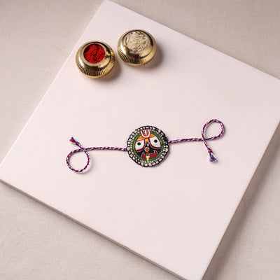 Lord Jagannath - Reusable Pattachitra Handpainted Rakhi with Potli 54