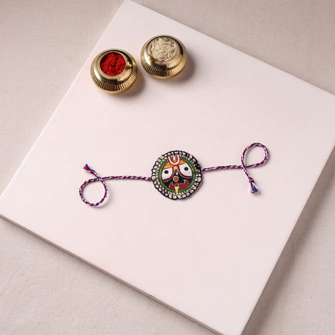 Lord Jagannath - Reusable Pattachitra Handpainted Rakhi with Potli 54