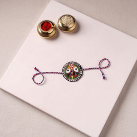 Lord Jagannath - Reusable Pattachitra Handpainted Rakhi with Potli 54