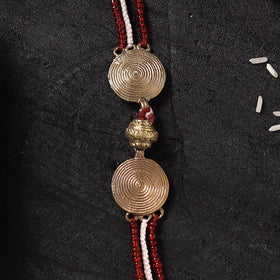 Multicolor - Handcrafted Tribal Dokra Brass Thread Rakhi with Banaras Wood Doll Box 34