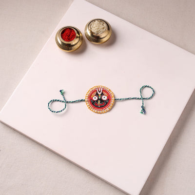 Lord Jagannath - Reusable Pattachitra Handpainted Rakhi with Potli 56