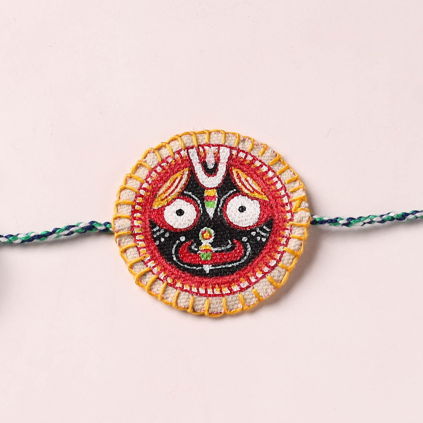 Lord Jagannath - Reusable Pattachitra Handpainted Rakhi with Potli 56